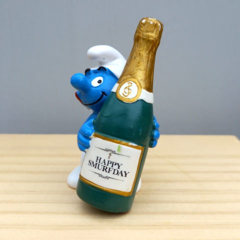 20708 Bottle Smurf With Champagne Bottle “Happy Smurferday”