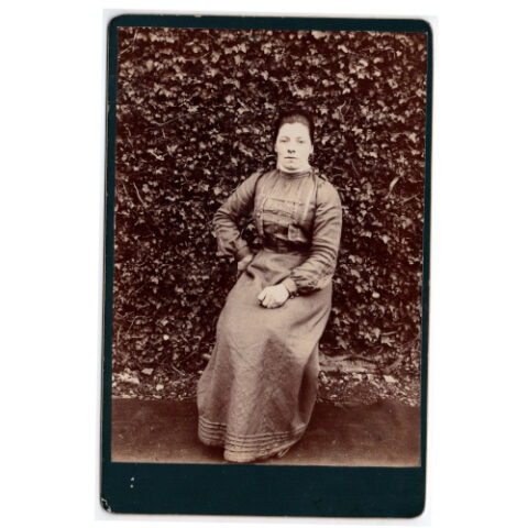 Cabinet Card of a Woman Sitting Outside (ANPI-004)