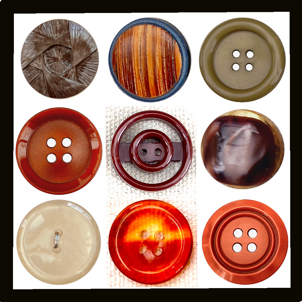Assorted vintage buttons in brown, tan, and beige colors displayed on a wooden surface