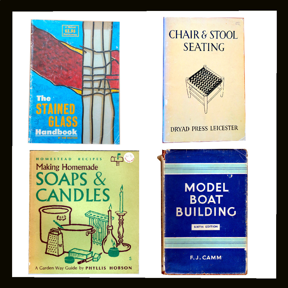Assorted craft books covering various DIY techniques with tools, materials, and handmade projects displayed together