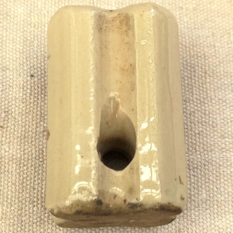 Vintage cream porcelain strainer corner insulator