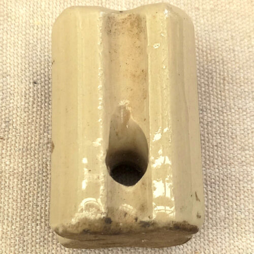 Vintage cream porcelain strainer corner insulator