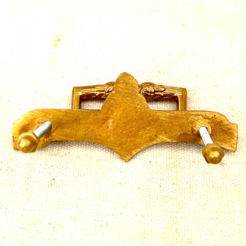 Vintage decorative brass swing pull handle with 77mm centre to centre spacing for furniture and cabinet restoration