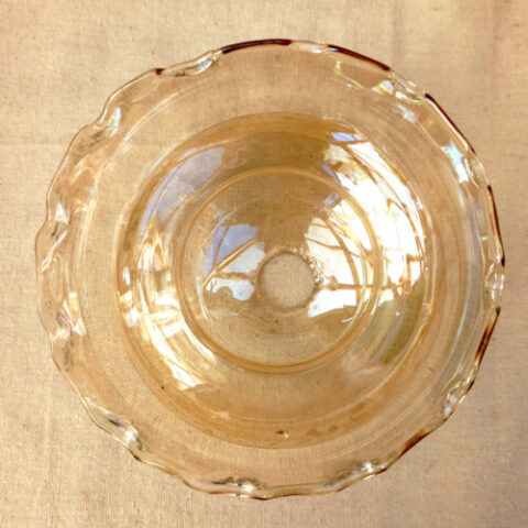 Vintage 1980s amber glass lamp shade featuring white floral pattern