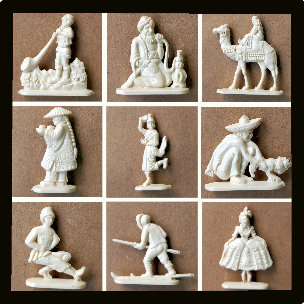 Small cream-colored 1950s German margarine prize figurines with detailed craftsmanship