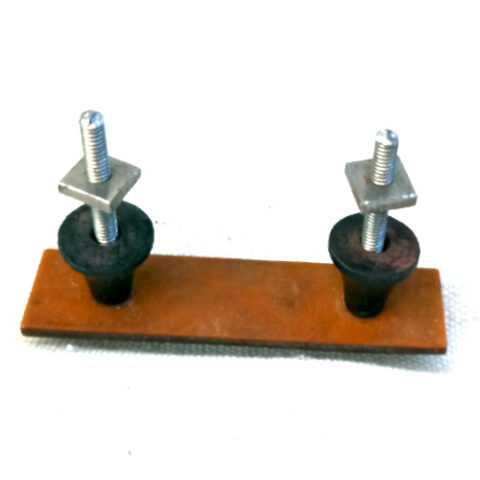 Art Deco cabinet pull handle in marbled tan Bakelite with a chrome centre and 46mm center-to-center spacing.