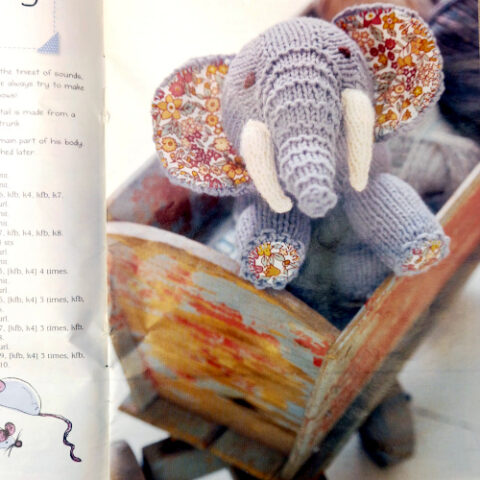 Knitted Storytime Toys book by Laura Long featuring handmade knitted dolls and whimsical toy patterns