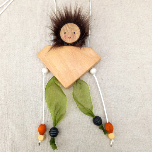 CLIMBSY wooden climbing toy handcrafted in New Zealand by Willow Bank, climbing up two strings step by step through gentle pulling motion.