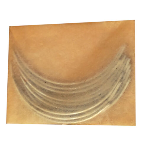 Vintage John James & Sons curved mattress needles, one dozen in original packaging close-up