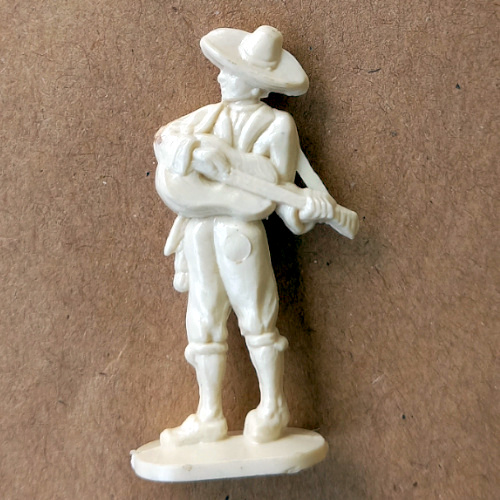 Vintage margarine figurine of Flamenco tocaores guitarist in traditional Spanish style close-up
