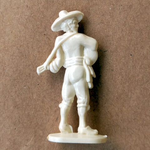 Vintage margarine figurine of Flamenco tocaores guitarist in traditional Spanish style close-up