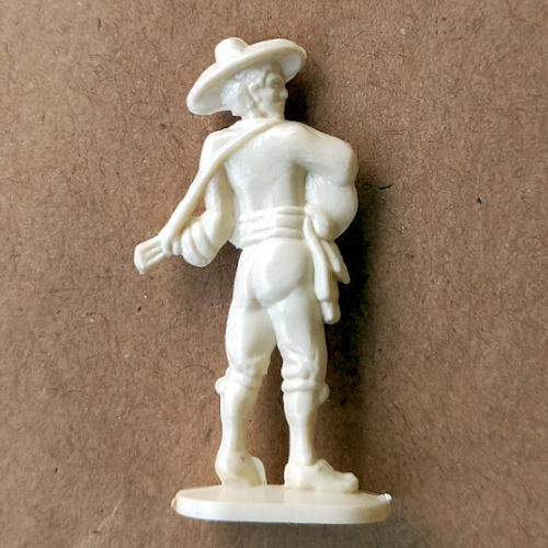 Vintage margarine figurine of Flamenco tocaores guitarist in traditional Spanish style close-up