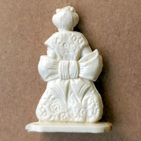 Vintage 1950s Japanese geisha margarine figurine with traditional kimono and retro molded detail