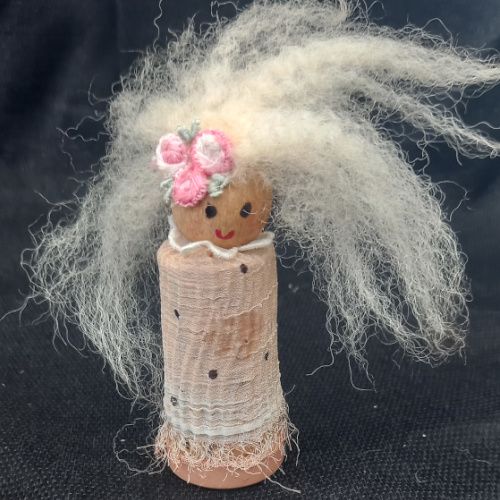 Handmade doll made from recycled wine corks