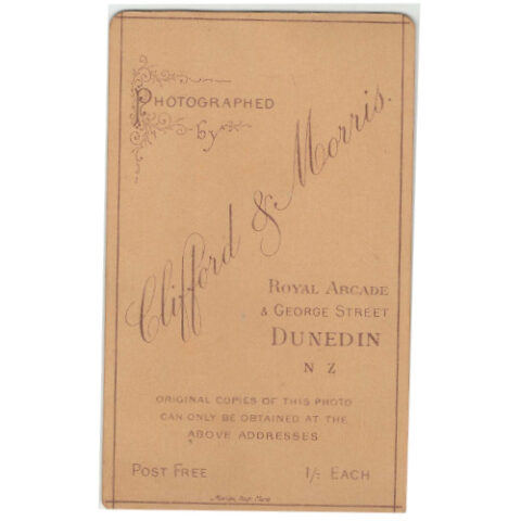 Carte de visite photograph of a woman standing by Clifford & Morris Dunedin New Zealand in Victorian studio portrait setting