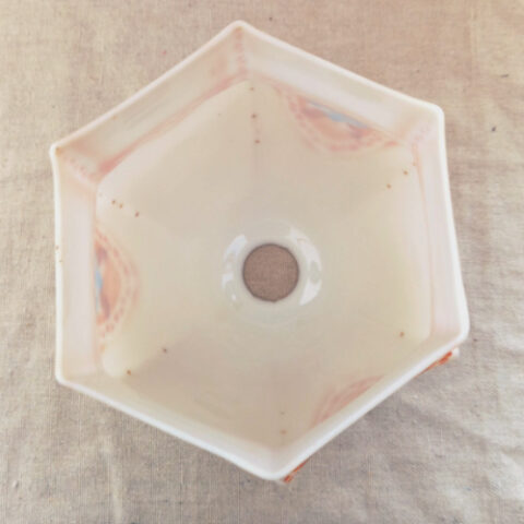 Vintage satin glass lamp shade with orange transfer printed geometric design and blue floral motif in Art Deco style.