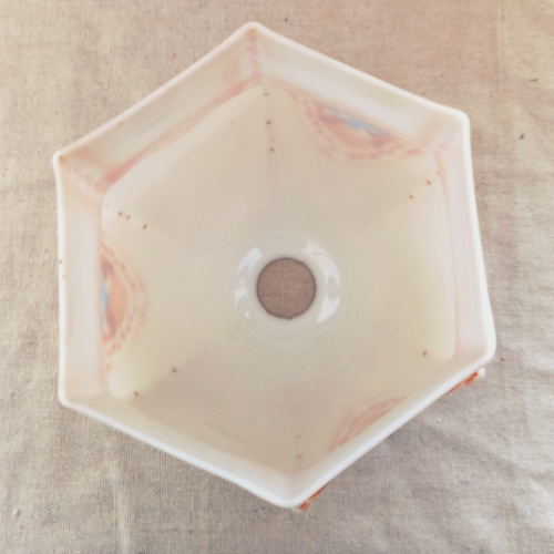 Vintage satin glass lamp shade with orange transfer printed geometric design and blue floral motif in Art Deco style.