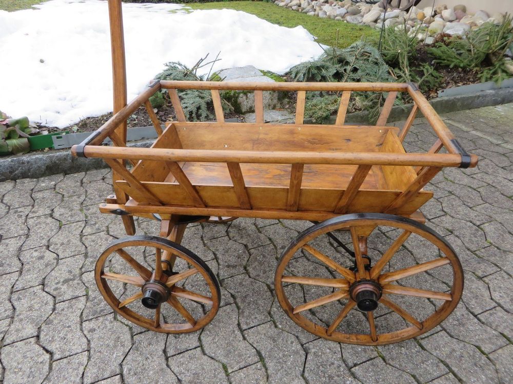 Traditional Swiss Leiterwägeli wooden handcart used for transporting goods in historic village life