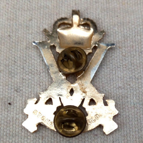 Vintage Victorian Rifle Association badge with crossed rifles, crown, large V and Victoria scroll, made by Stokes Melbourne, Australia.