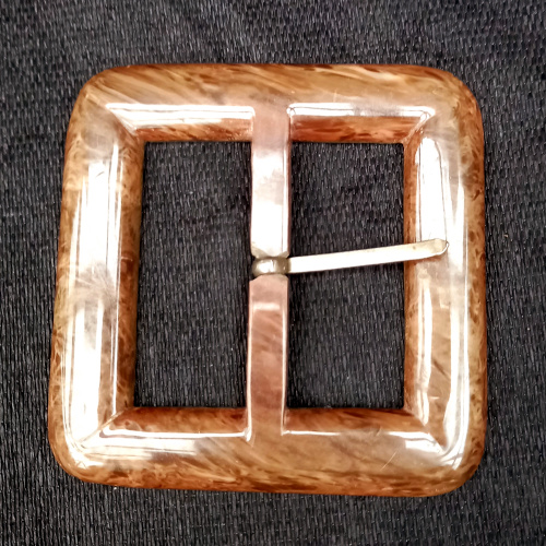 Large 1960s brown marbled square vintage belt buckle with retro styling.
