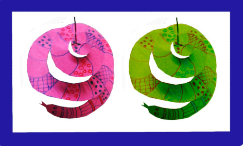 Colourful paper snake hanging from a string as a fun children's craft project.