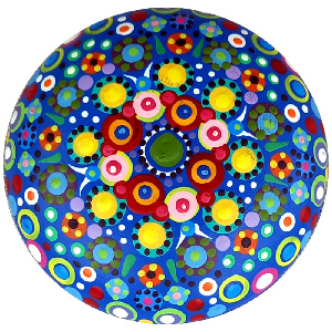 Hand-painted mandala stone created with dot painting techniques