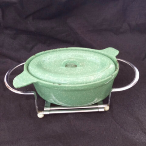Vintage Swiss Extensio extendable metal hot pot carrier and trivet holder with patent O.H.Z. Brevete marking, mid-century kitchen accessory.