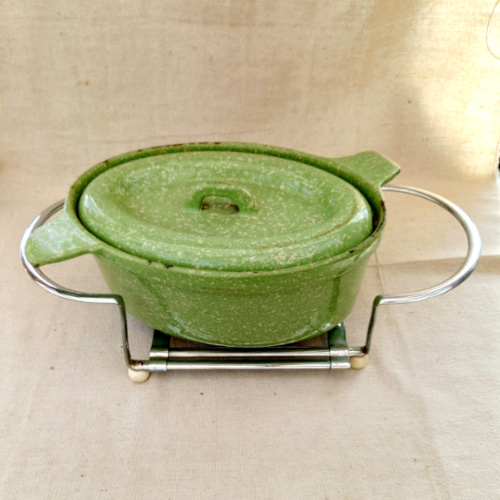 Vintage Swiss Extensio extendable metal hot pot carrier and trivet holder with patent O.H.Z. Brevete marking, mid-century kitchen accessory.
