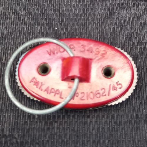 Vintage Patons flat knitting row counter with two rotating number discs and swivel finger ring.