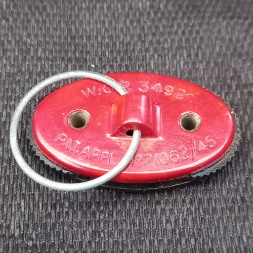 Vintage Patons flat knitting row counter with two rotating number discs and swivel finger ring.