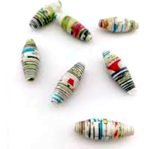 Colourful handmade paper beads used for jewellery and decorative crafts.