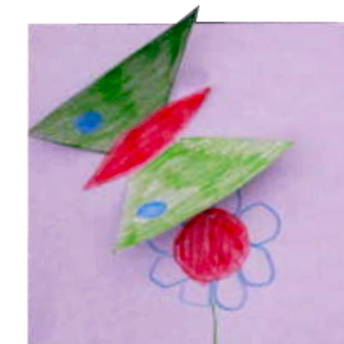 Child's 3D butterfly picture made with colourful paper butterflies attached to a drawing.