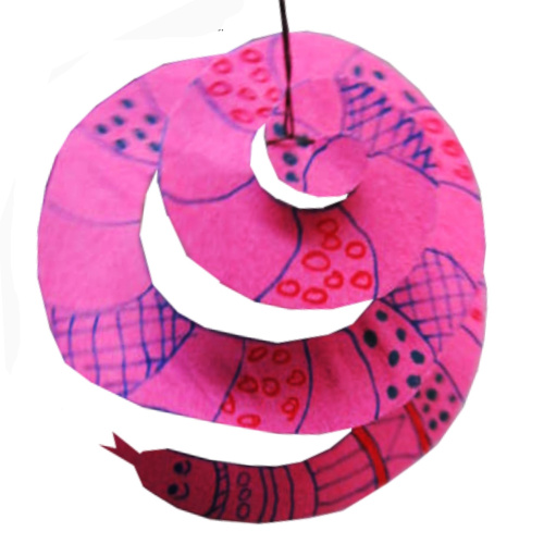 Colourful paper snake hanging from a string as a fun children's craft project.