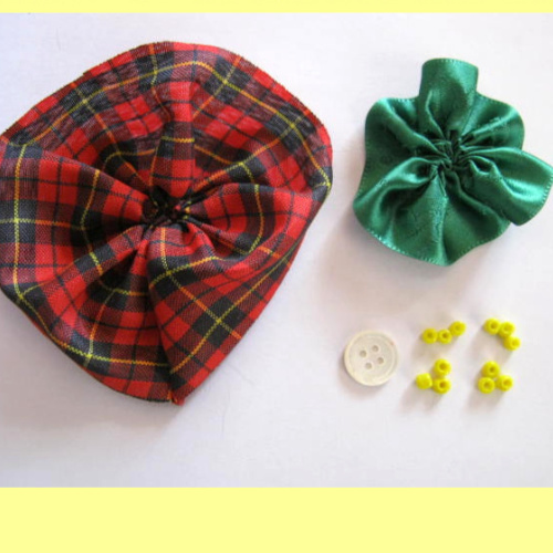 DIY ribbon flower craft showing handmade ribbon flowers used as brooch, hair accessory, and decoration.