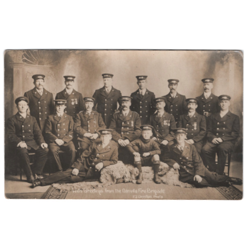 Vintage postcard showing the Gonville Fire Brigade photographed by F. J. Denton, a historic New Zealand image of early firefighting and local heritage.