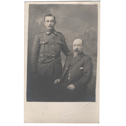 WWI real photo postcard of a soldier posing with his father, photographed by Rose of Westport.