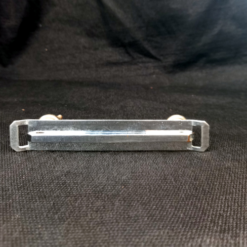 Art Deco chrome cabinet handle with 85mm centre-to-centre fixing for drawers and cupboard doors.