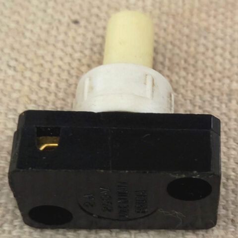 Vintage Bruma 2A 250VAC on-off push button lamp switch with glow in the dark button.