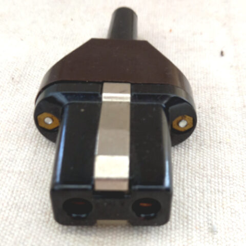 Vintage electric kettle replacement plug with durable connector for classic kettles.