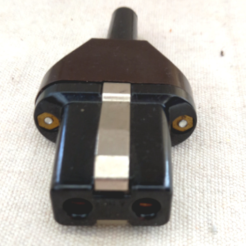 Vintage electric kettle replacement plug with durable connector for classic kettles.