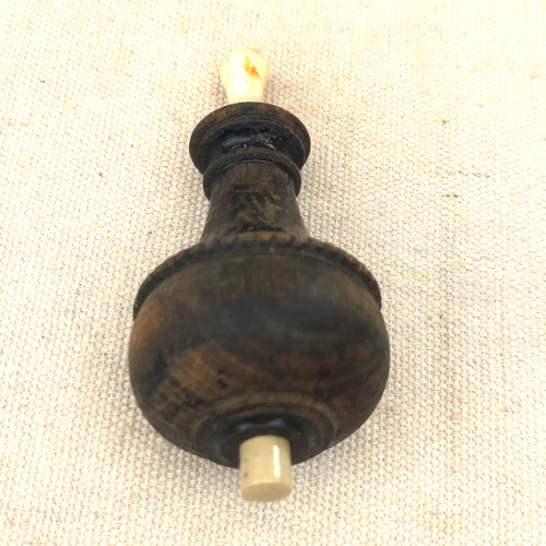 Antique wood British Butler bell push with vintage wooden surround and traditional brass push button.