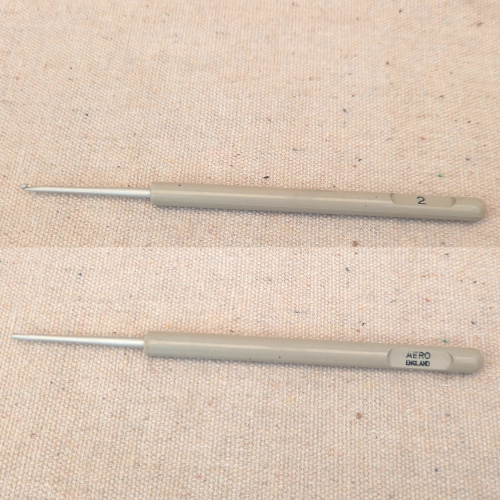 Vintage AERO No. 2 aluminium crochet hook with a grey plastic handle, 2mm size.