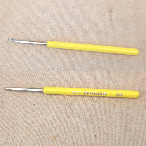 Vintage FONTANA No. 3.5 steel crochet hook with a yellow plastic handle, 3.5mm size.