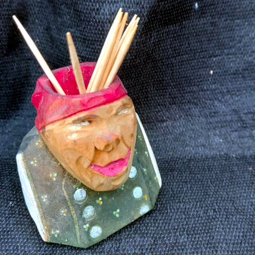 Handcrafted Austrian wooden bust toothpick holder souvenir from Innsbruck with traditional folk art detailing.