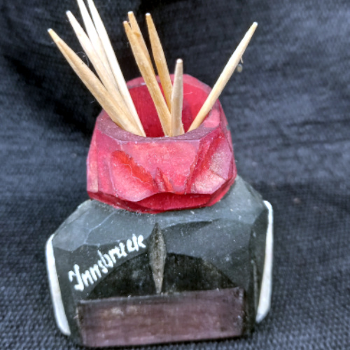 Handcrafted Austrian wooden bust toothpick holder souvenir from Innsbruck with traditional folk art detailing.