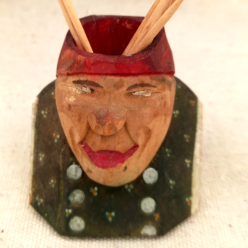 Handcrafted Austrian wooden bust toothpick holder souvenir from Innsbruck with traditional folk art detailing.