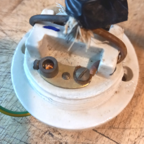How to attach a lamp cable to a ceiling rose when installing a pendant light