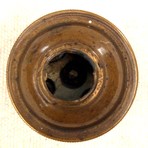 Vintage E27 brass and porcelain lamp socket for antique and industrial lighting restoration.