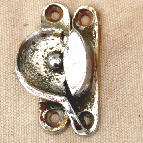 Metal window sash lock and keeper for timber sash windows.