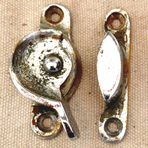 Metal window sash lock and keeper for timber sash windows.